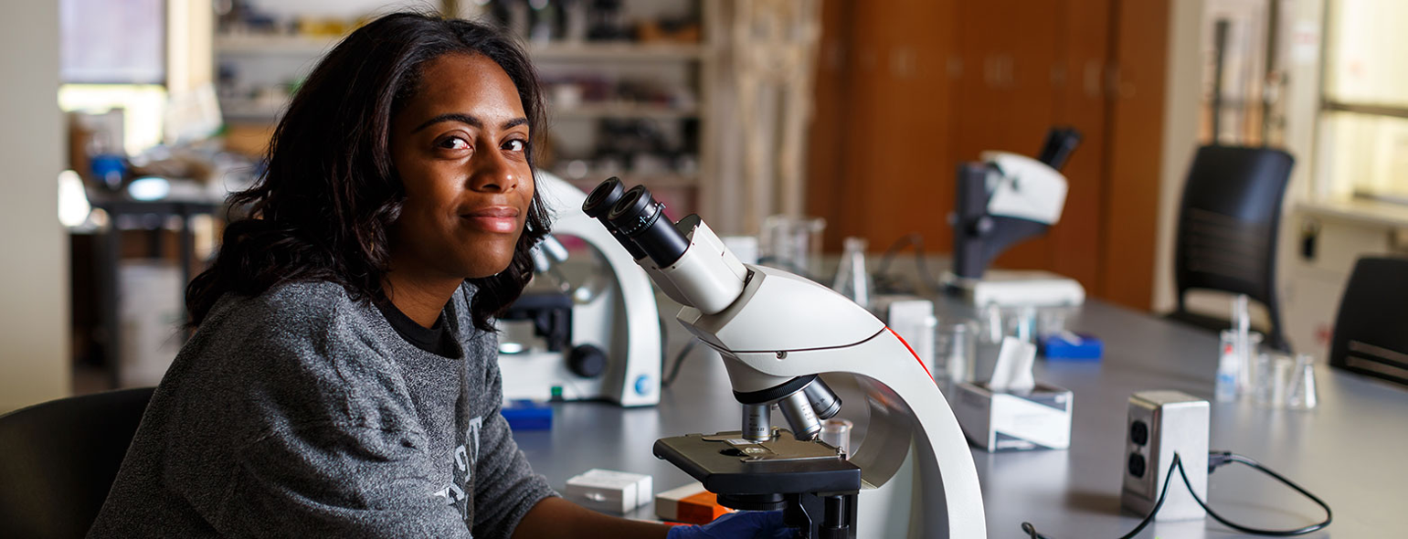 Female Student in science lab
